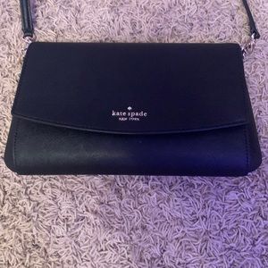 Black Kate spade purse only used once in great condition.
